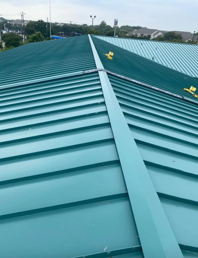 Green commercial metal roof ridge and valley for Metal Roof Repair in Muskego