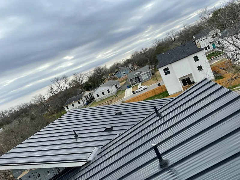 Standing seam metal roof panels with vents for Skylight Repair in Muskego